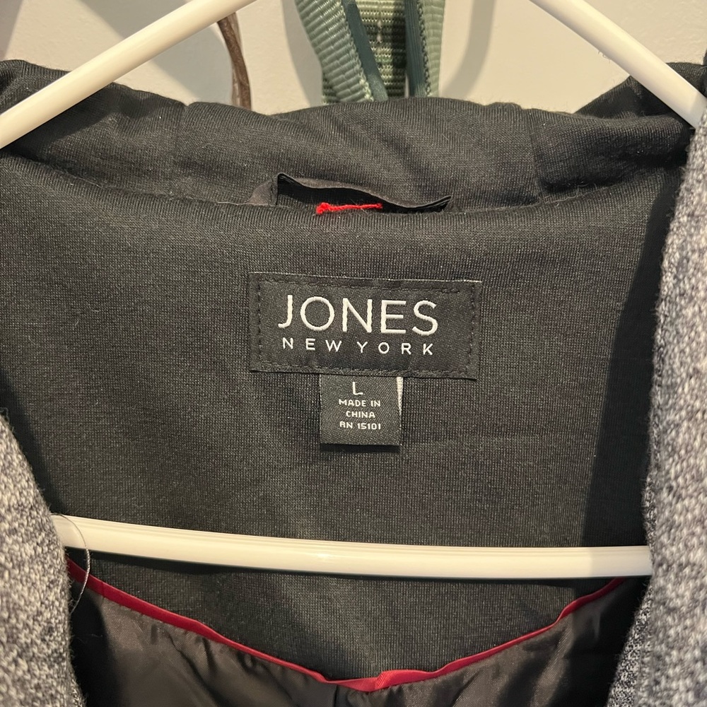 Size Large color-grey. Never been worn.  Not once.
